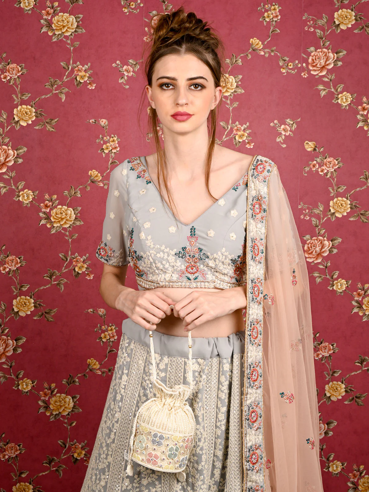 Odette Women Apricot Cutdana Embellished Potli Bag - Image 2