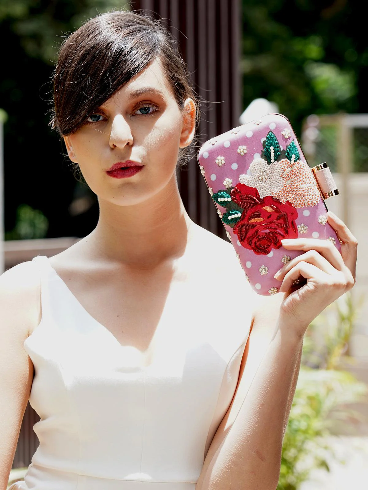 Odette Women Rectangular Shape Peach Embellished Clutch!