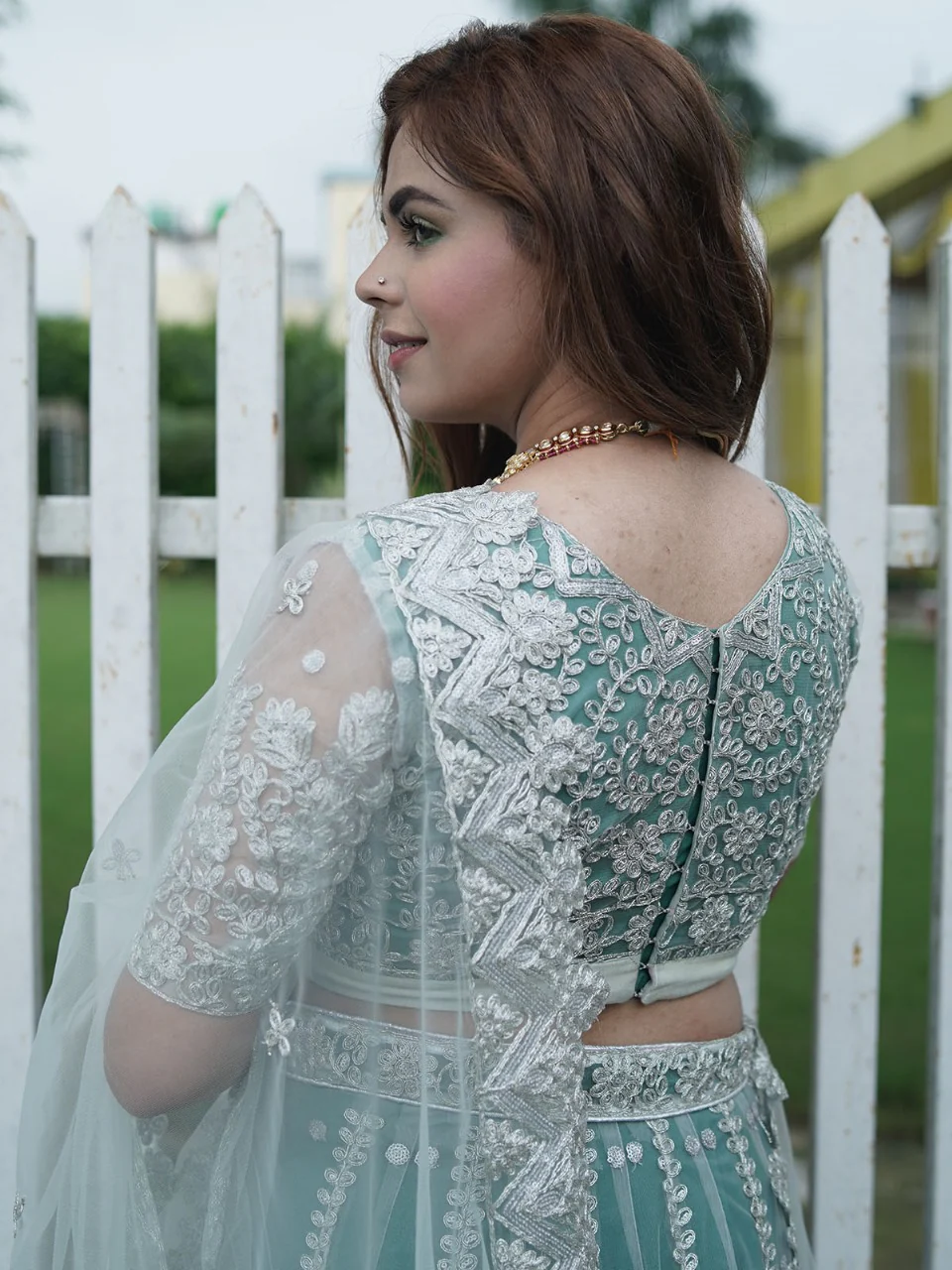 Odette Women Green Net Semi Stitched Lehenga With Unstitched Blouse - Image 6