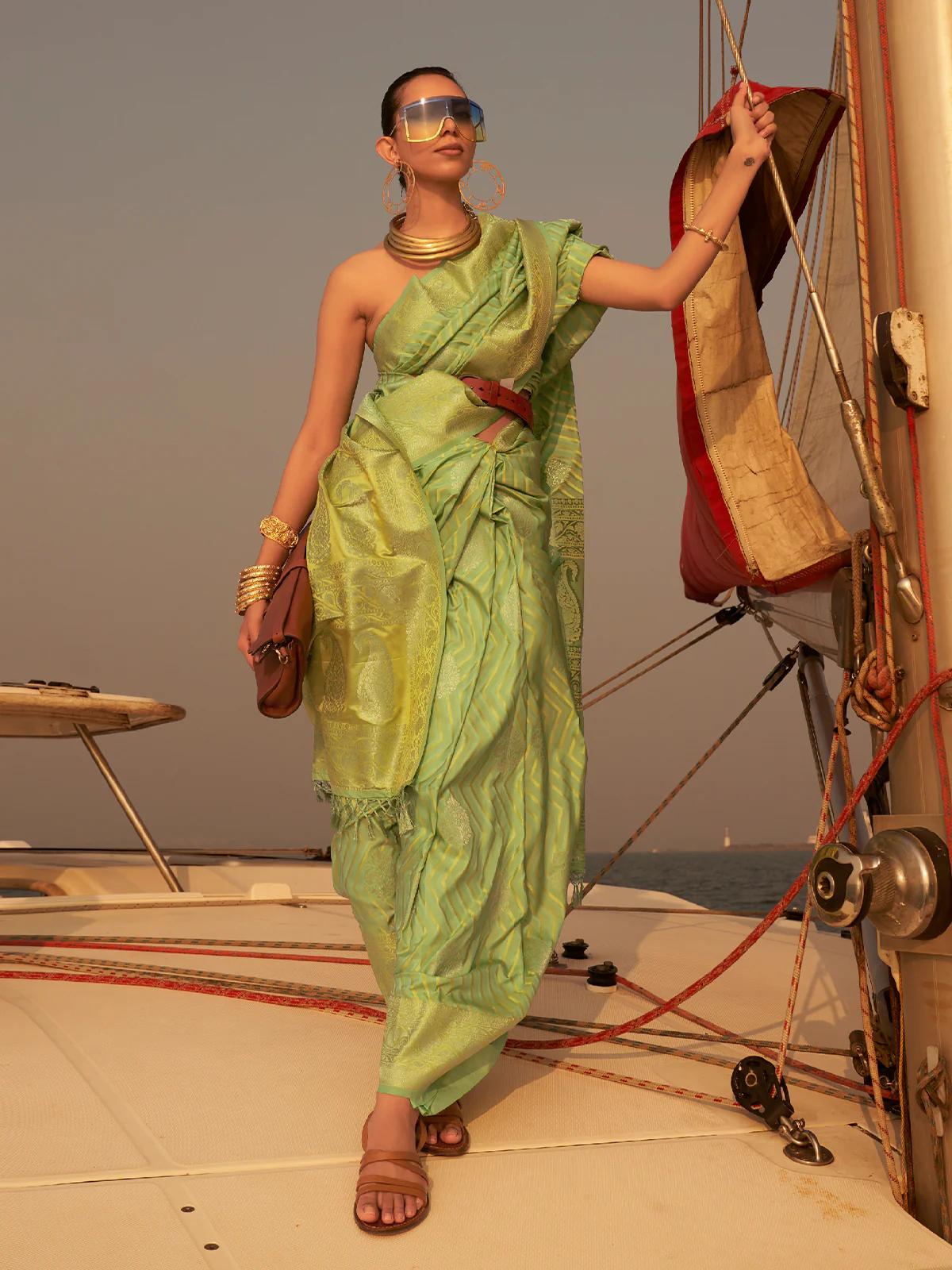 Odette Women Green Silk Blend Woven Saree With Unstitched Blouse