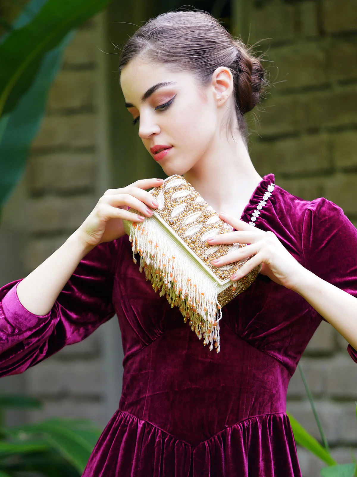 Odette Women Hi-Shine Gold And White Tasseled Clutch Bag - Image 3