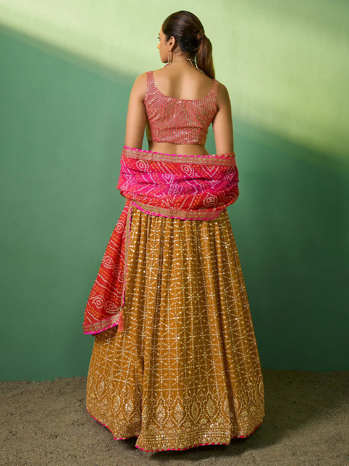 Odette Women  Mustard Embroidered Semi Stitched Lehenga With Unstitched Blouse - Image 4
