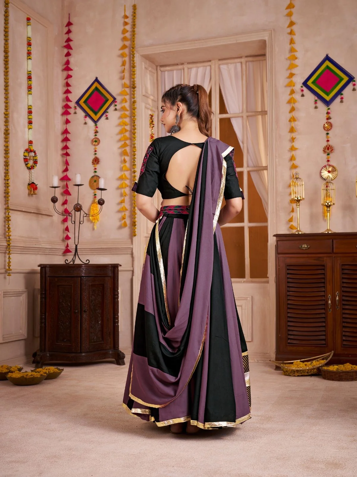 Odette Black And Mauve Cotton Blend Solid With Golden Border Semi-Stitched Lehenga For Women - Image 2