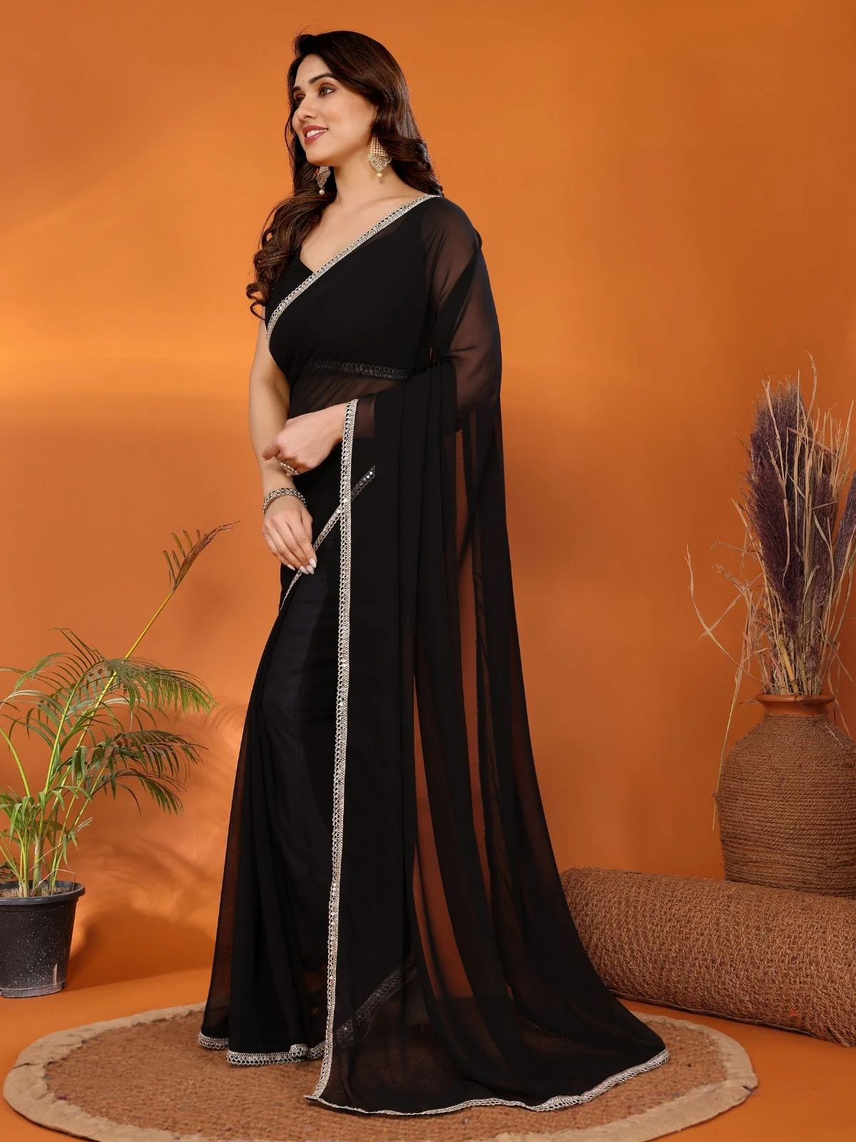 Odette Black Georgette Plain Saree With Unstitched Blouse For Women - Image 2