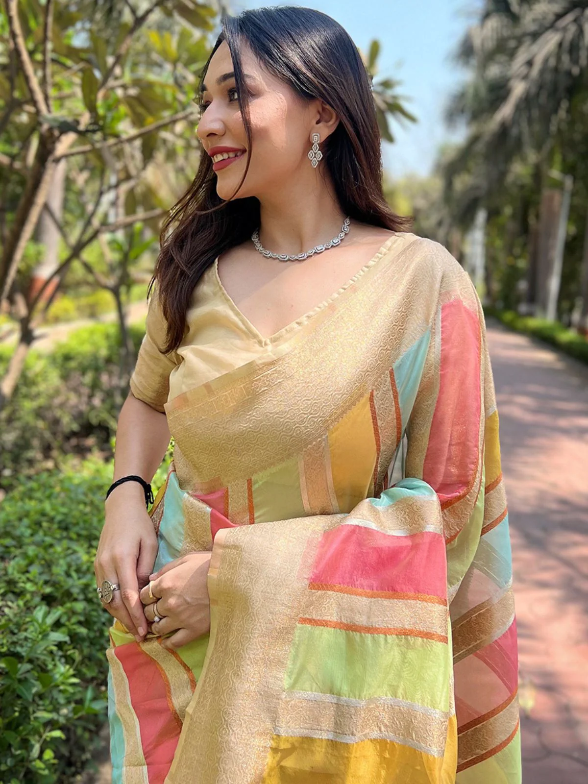 Odette Cream Woven Design Organza Saree With Unstitched Blouse For Women - Image 3