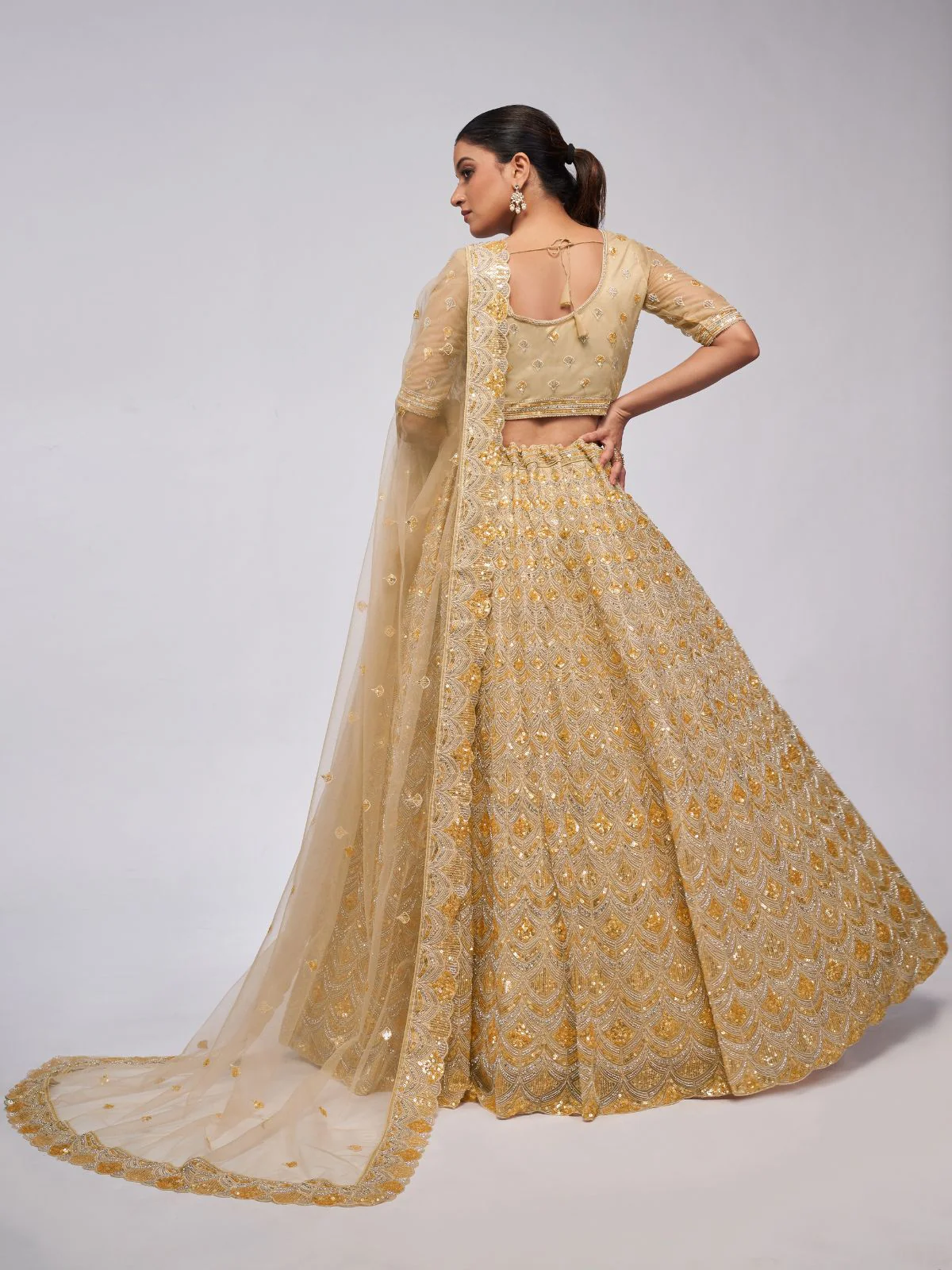 Odette Golden Soft Net Embroidered Semi Stitched Lehenga With Unstitched Blouse For Women - Image 5