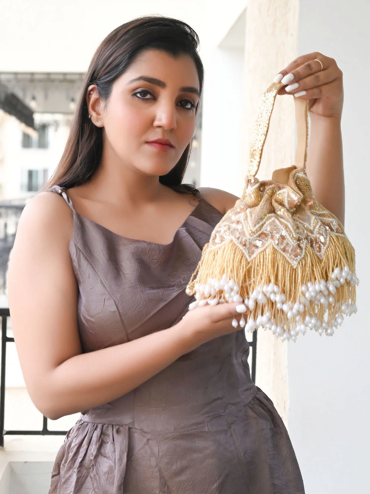 Odette Golden Suede With Sequin And Beads Tassels Potli For Women
