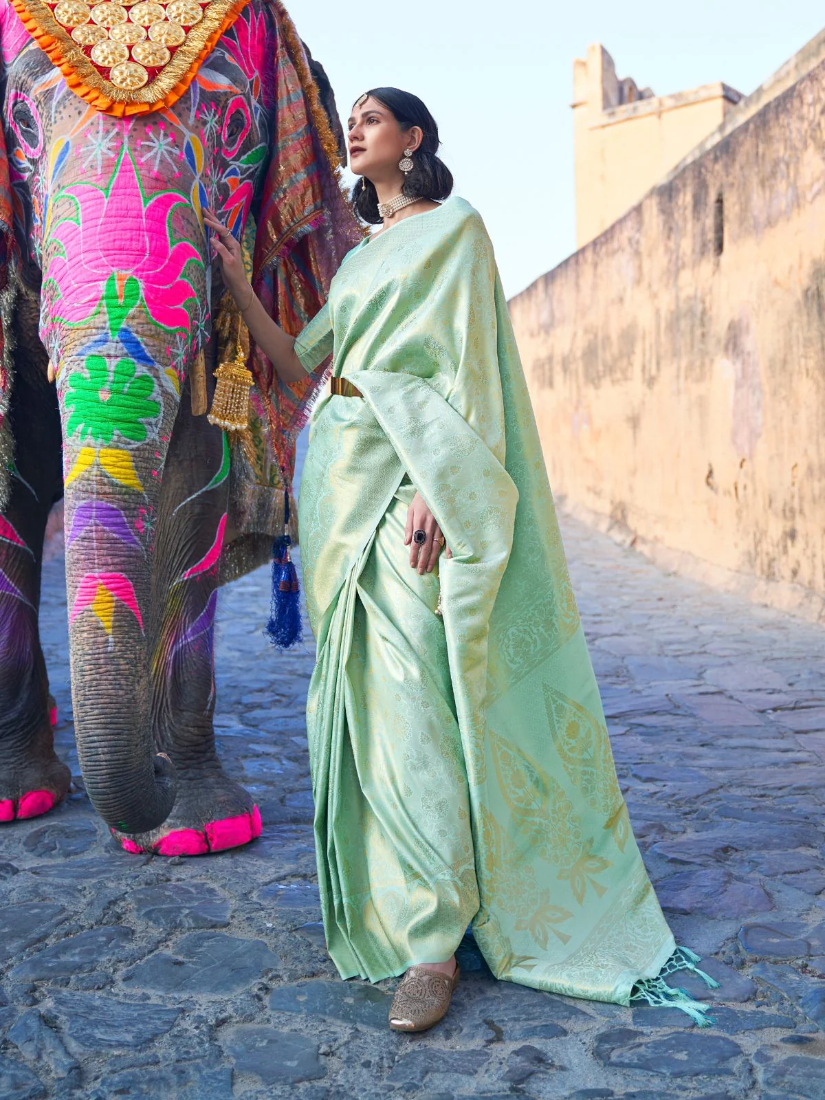 Odette Light Green Woven Design Silk Blend Saree With Unstitched Blouse For Women