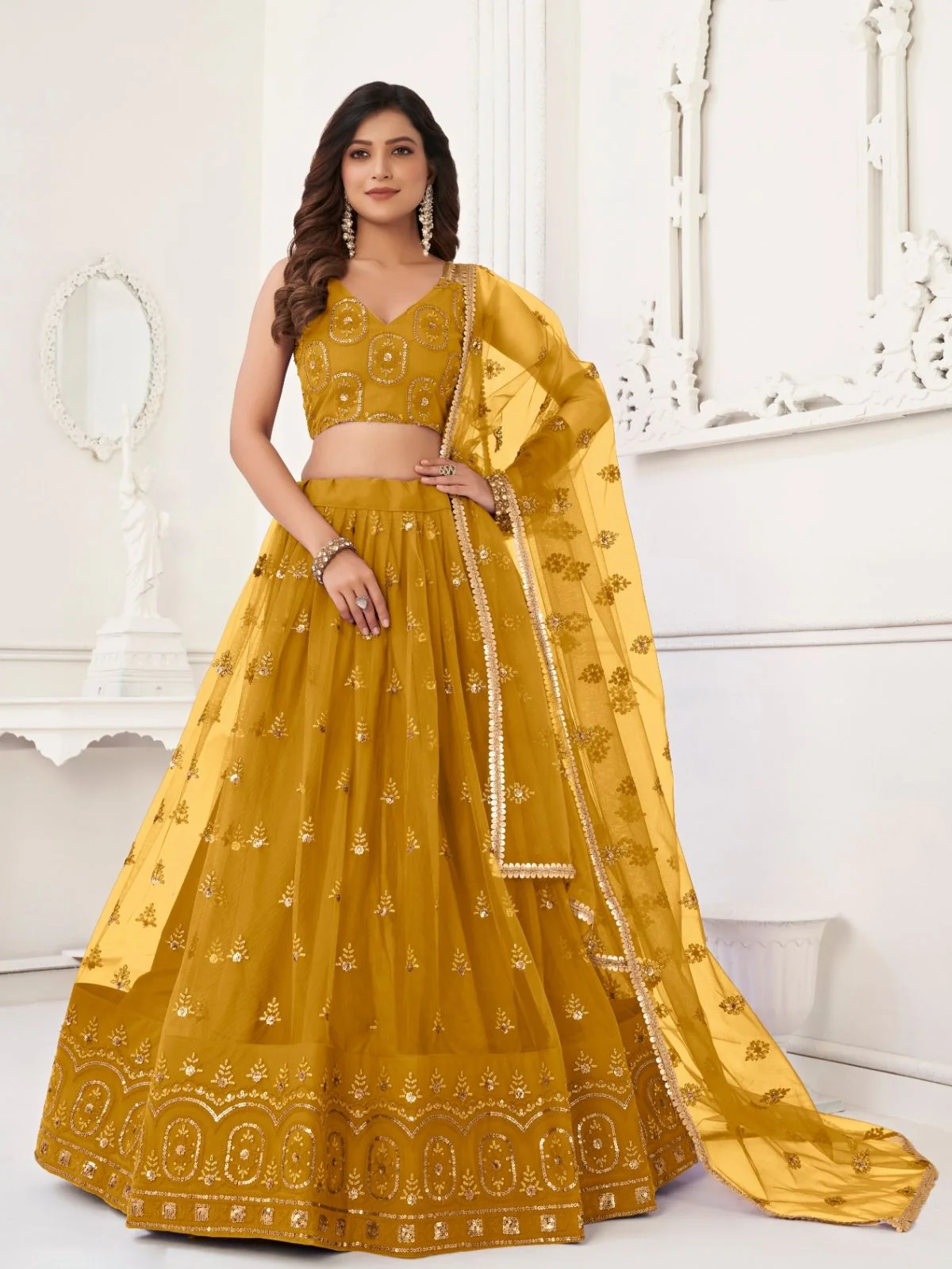 Odette Mustard Net Embroidered Semi Stitched Lehenga For Women