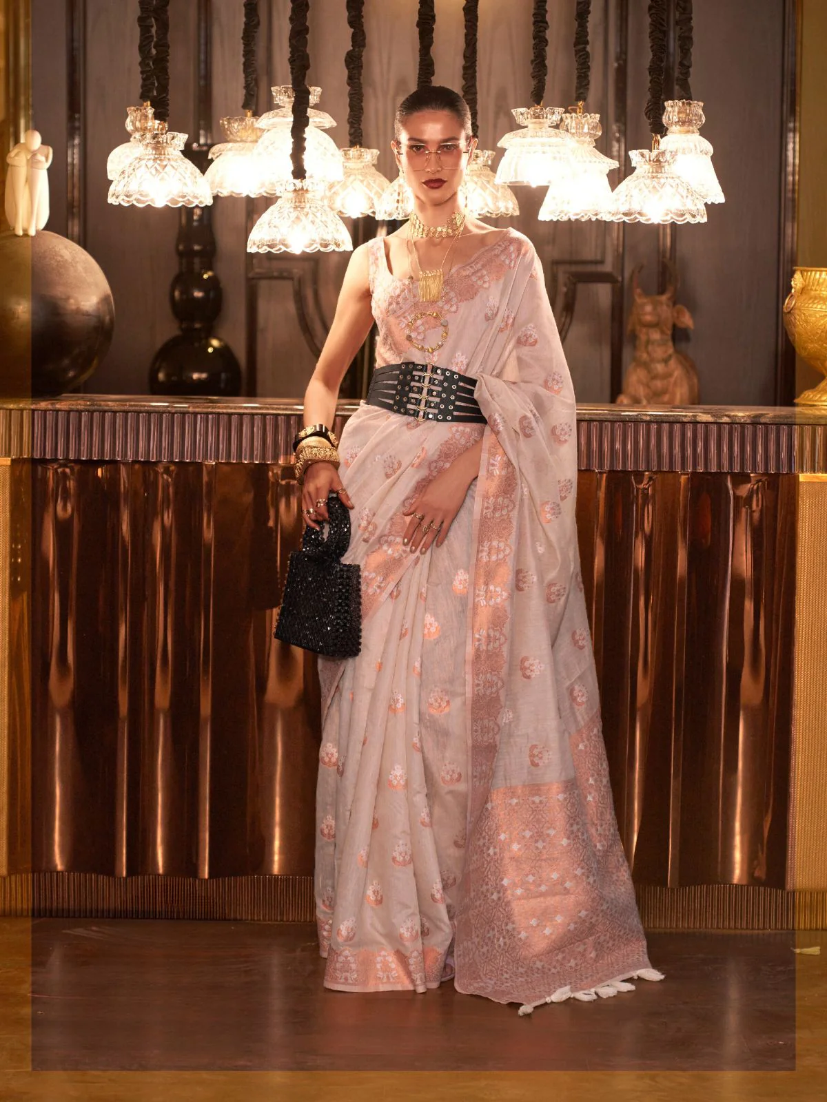 Odette Off White Linen Woven Saree With Unstitched Blouse For Women