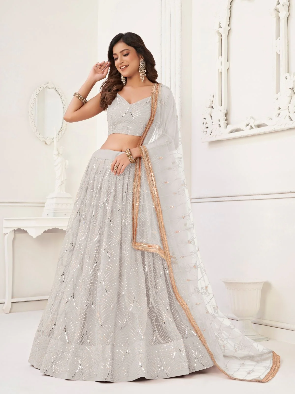 Odette Off White Net Embroidered Semi Stitched Lehenga For Women - Image 2