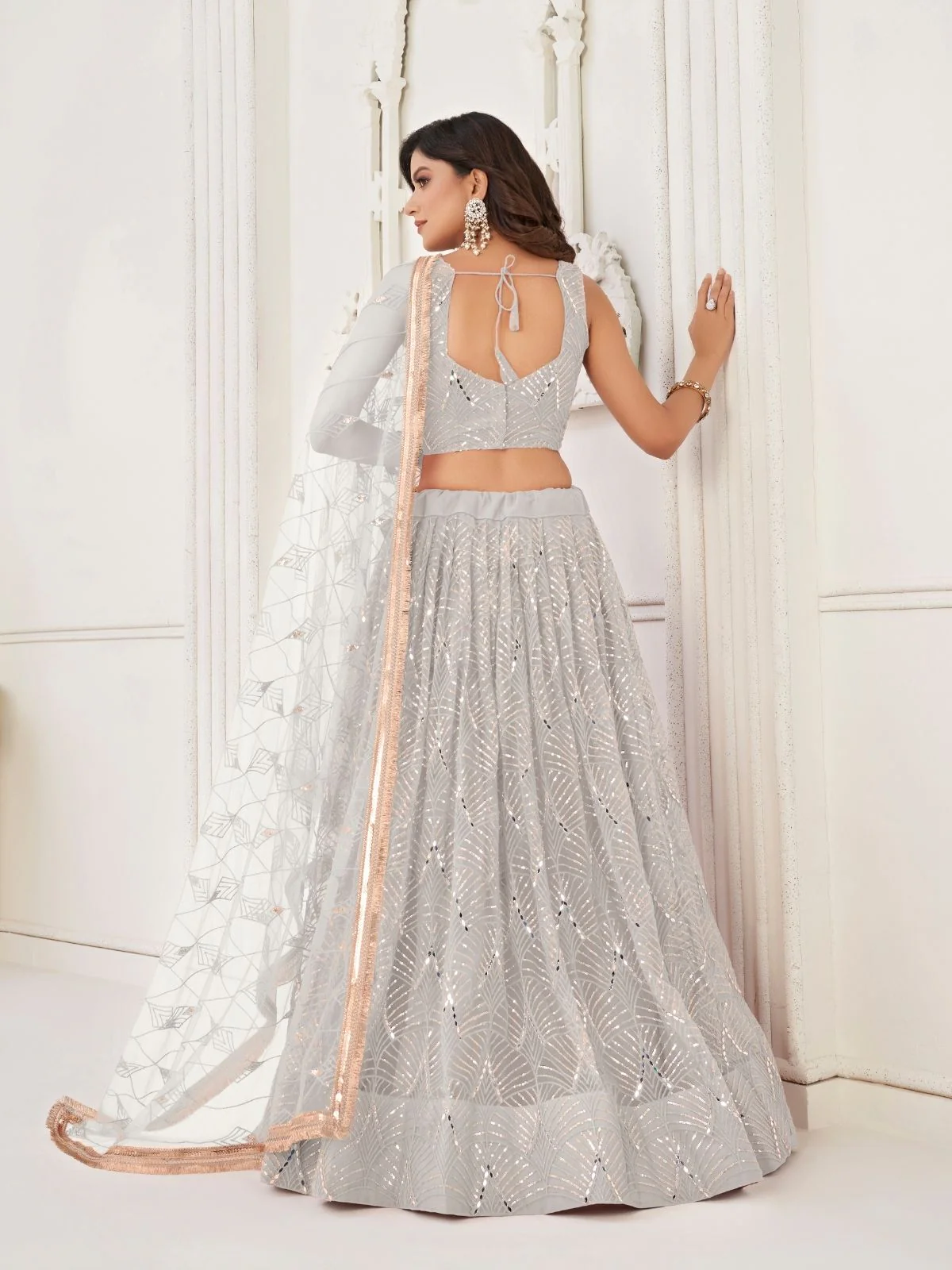 Odette Off White Net Embroidered Semi Stitched Lehenga For Women - Image 3