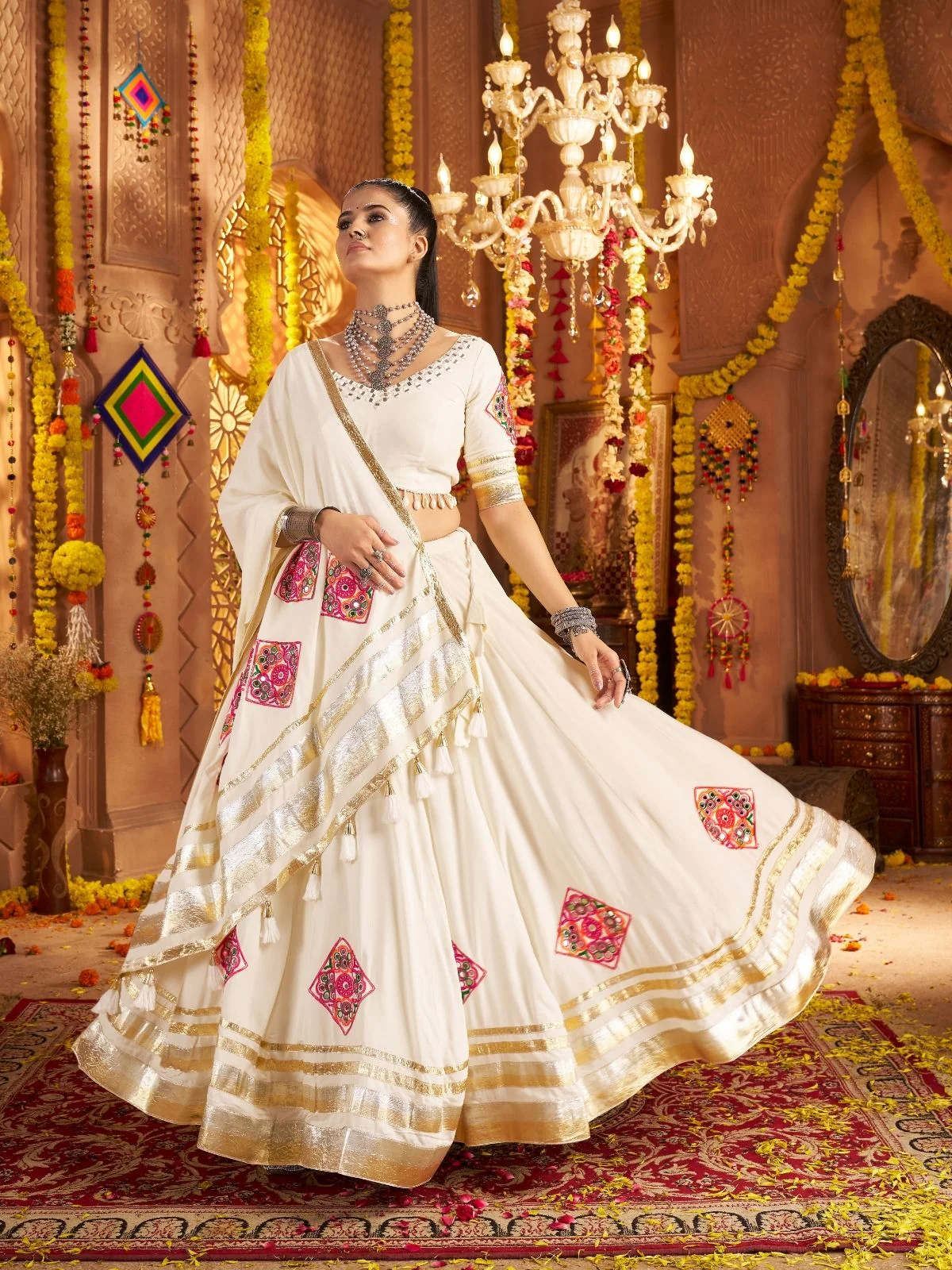 Odette Off White Viscose Rayon Rabari Work Semi-Stitched lehenga With Stunning Tassels For Women