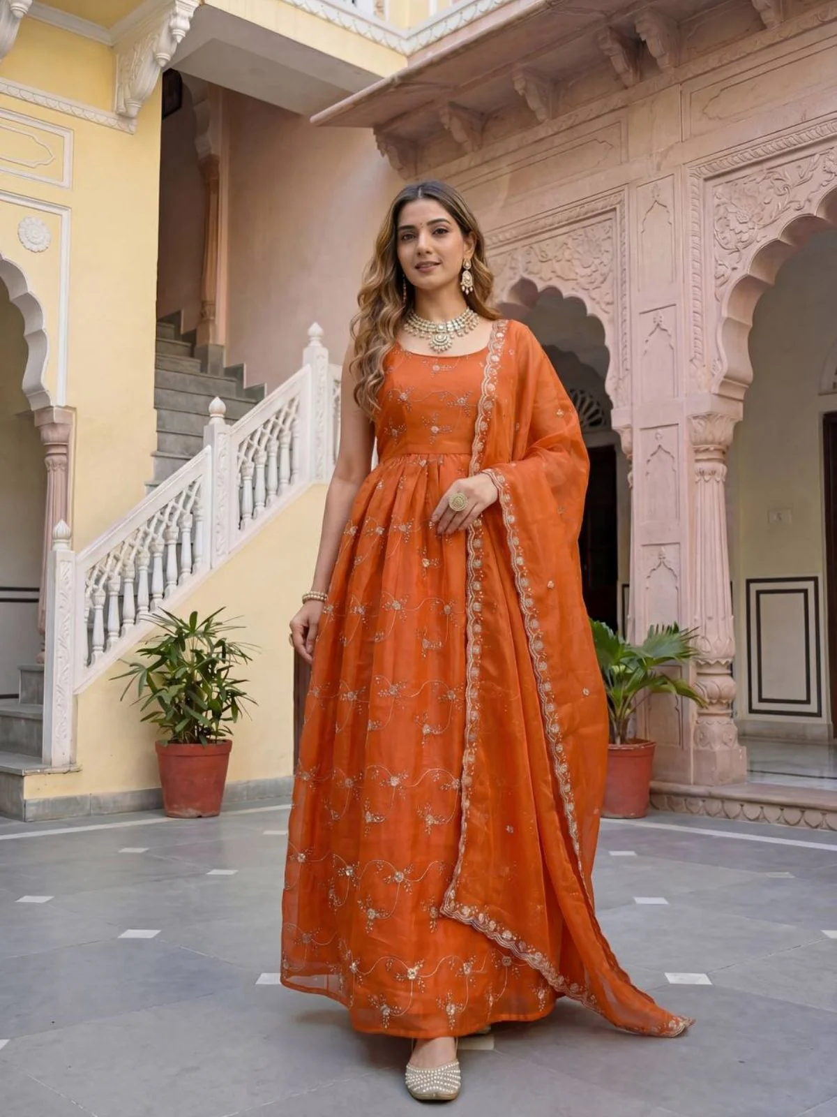 Odette Orange Georgette Solid Stitched Kurta Set For Women