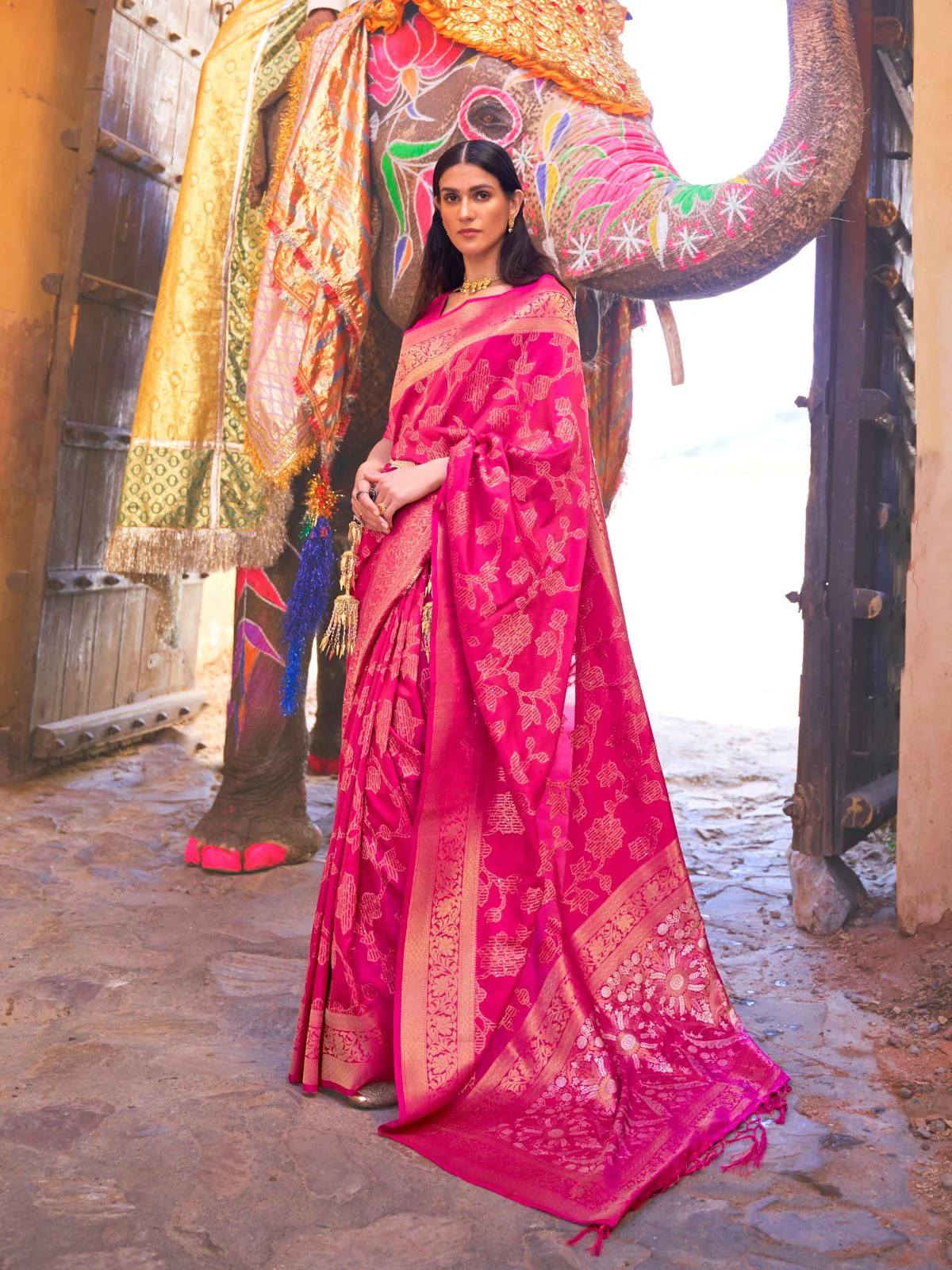 Odette Pink Woven Design Silk Blend Saree With Unstitched Blouse For Women