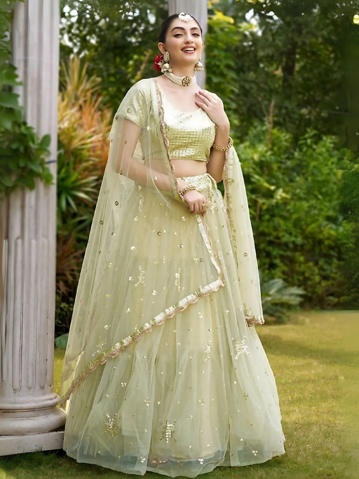 Odette Pista Green Net Embellished Semi-Stitched Lehenga For Women