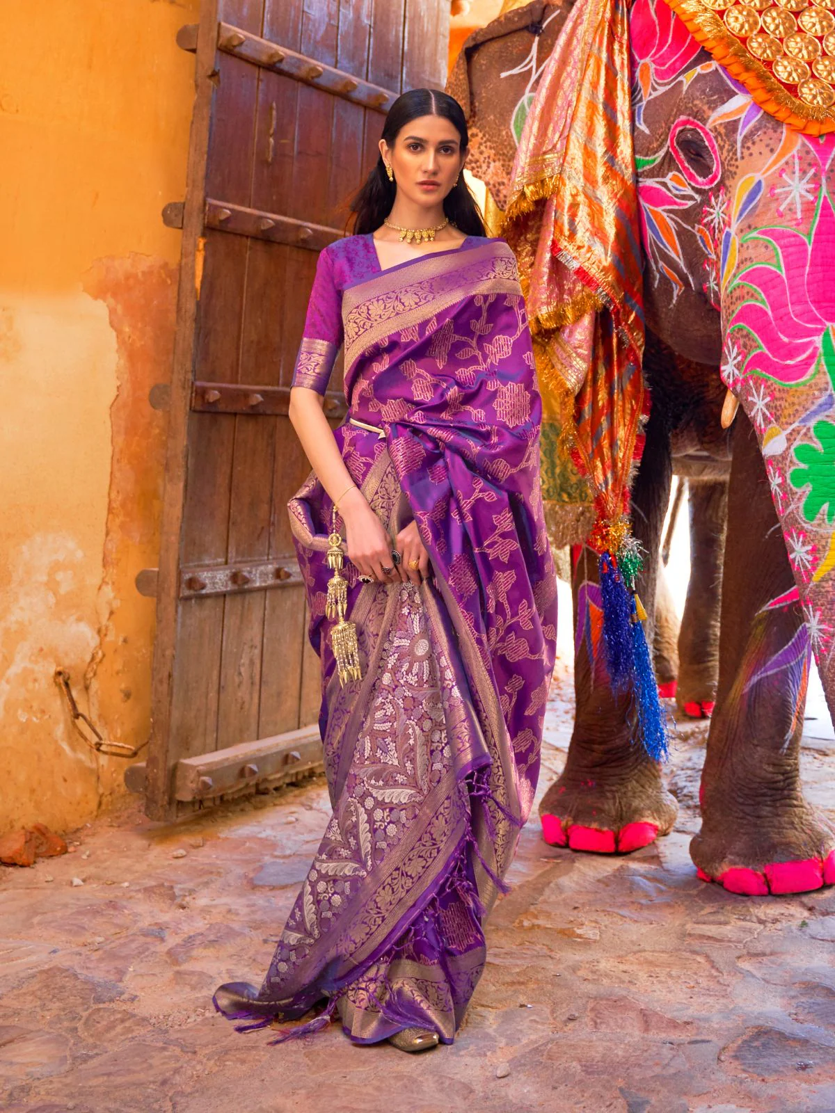 Odette Purple Woven Design Silk Blend Saree With Unstitched Blouse For Women