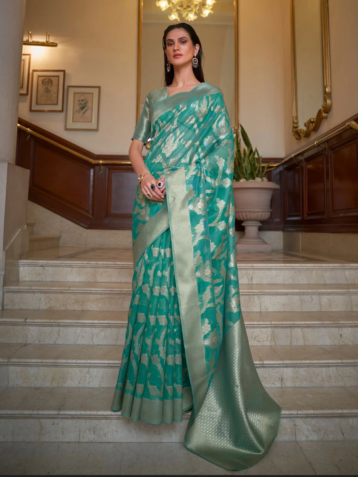 Odette Teal Woven Design Silk Blend Saree With Unstitched Blouse For Women