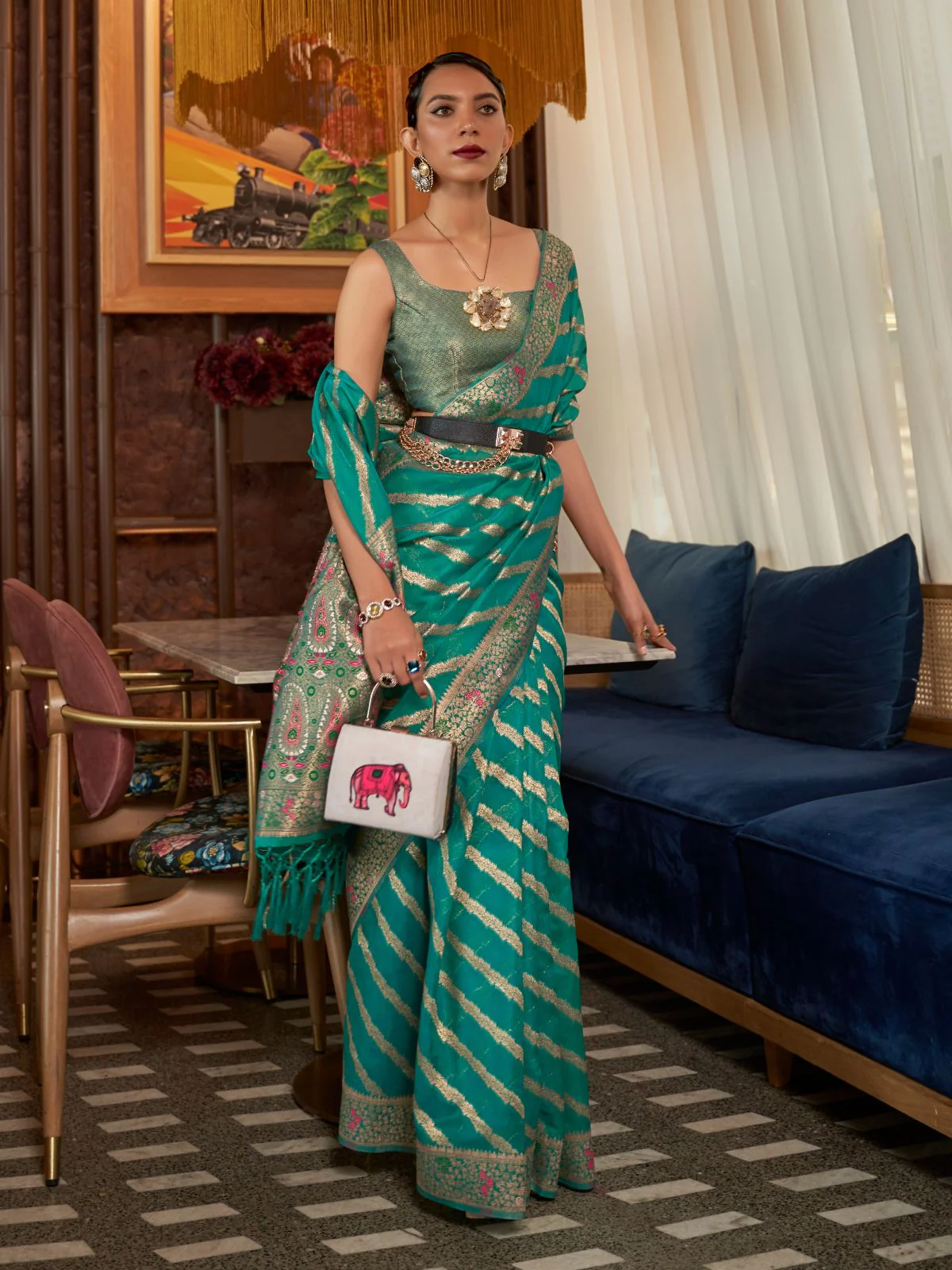 Odette Teal Woven Design Silk Blend Saree With Unstitched Blouse For Women