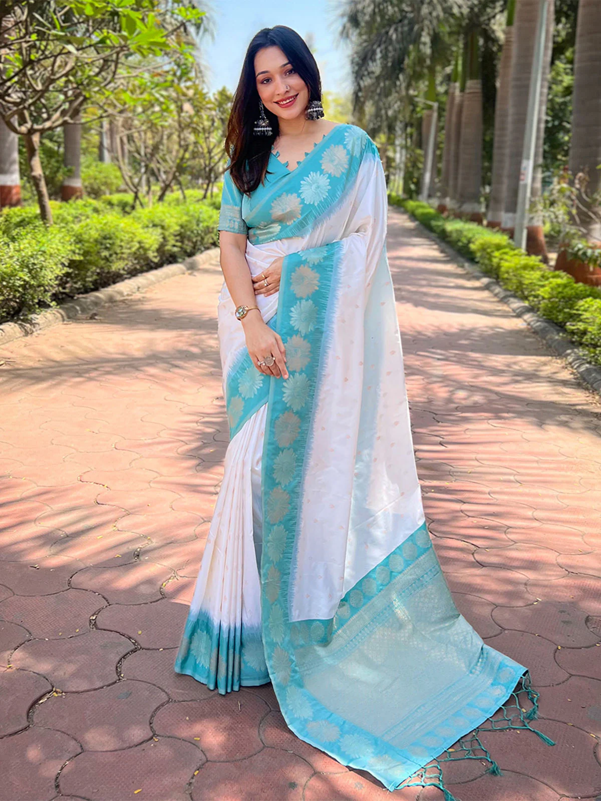 Odette White Woven Design Soft Silk Saree With Unstitched Blouse For Women