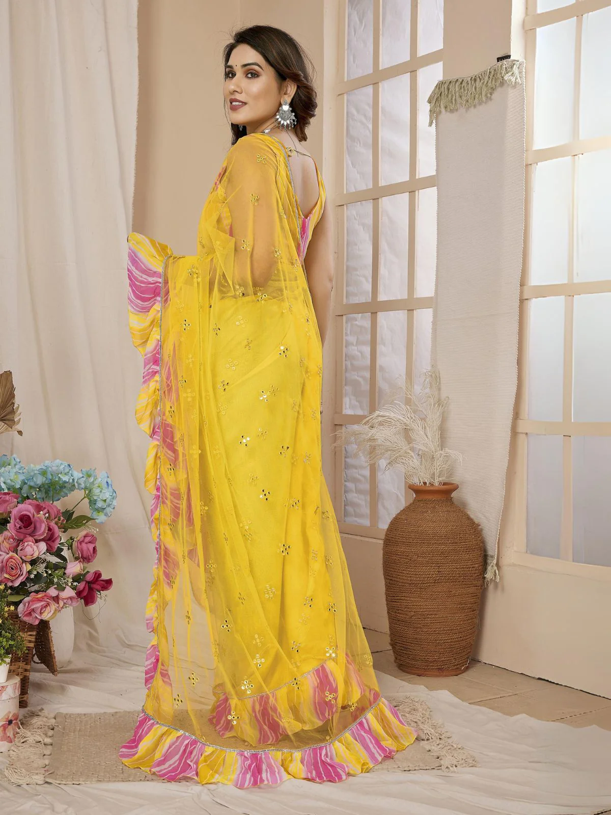 Odette Women Yellow Net Mirror Work Saree With Unstitched Blouse - Image 5