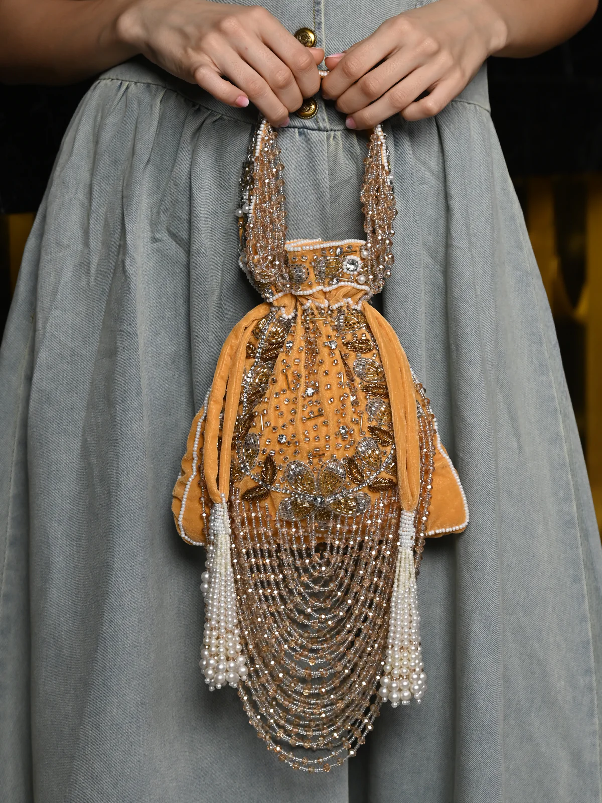 Odette Yellow Embroidered Potli Bag with Tassels For Women - Image 2