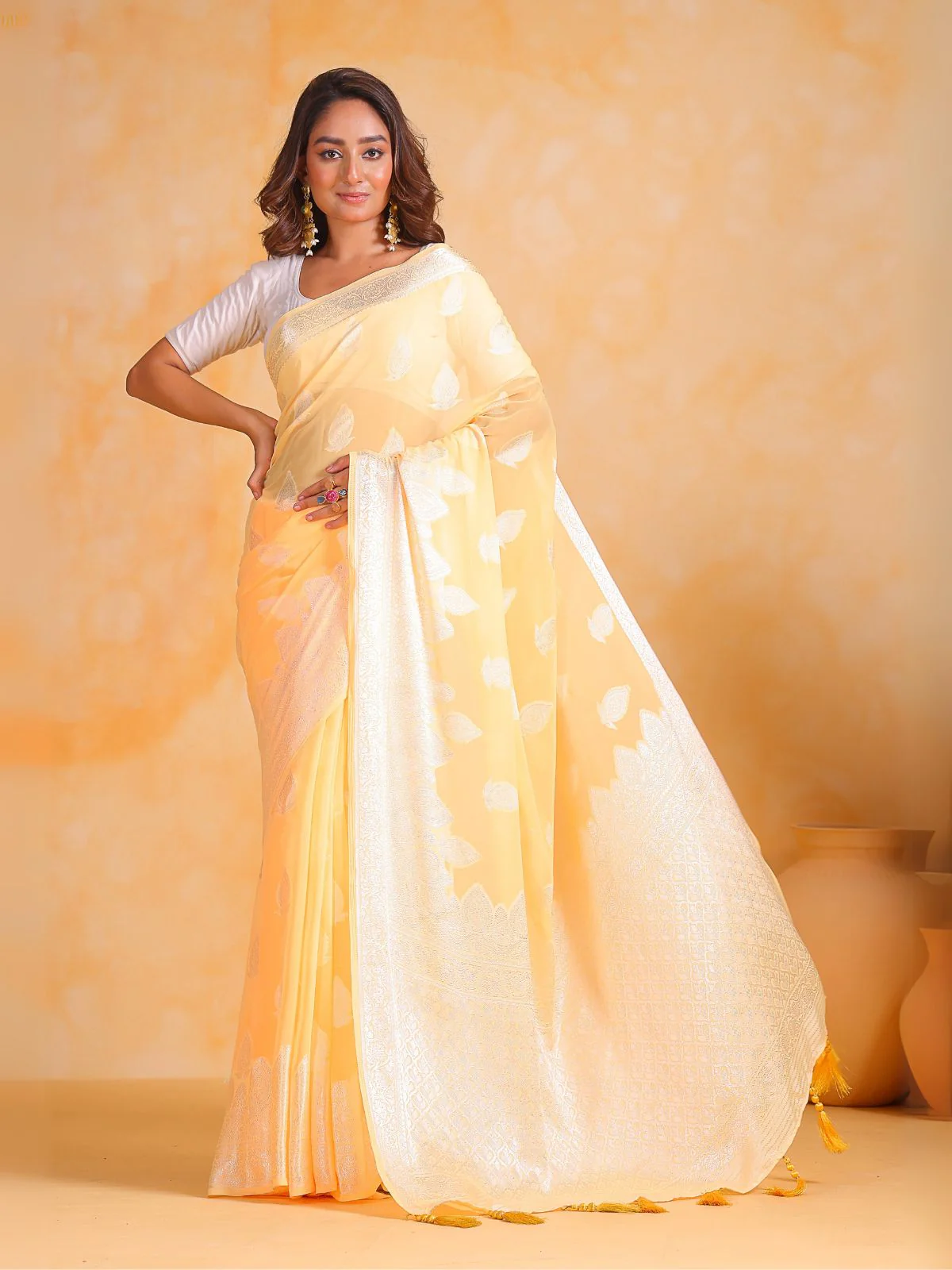 Odette Yellow Georgette Woven Design Saree With Unstitched Blouse For Women