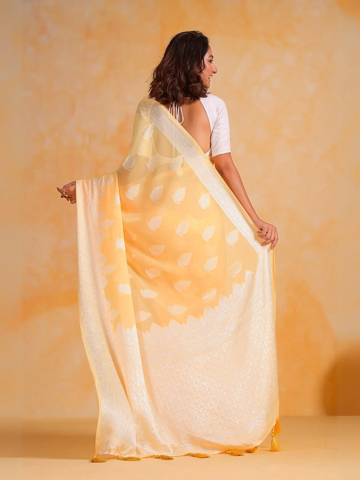 Odette Yellow Georgette Woven Design Saree With Unstitched Blouse For Women - Image 4