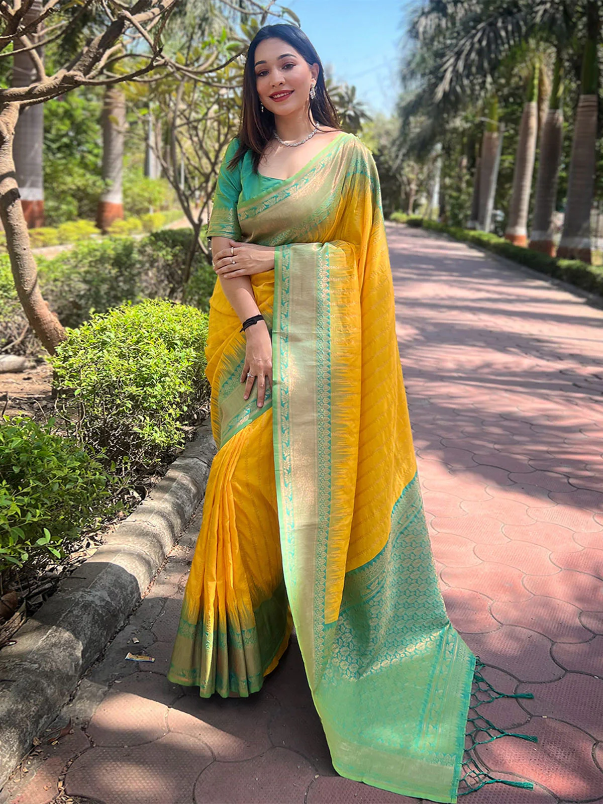Odette Yellow Woven Design Soft Silk Saree With Unstitched Blouse For Women