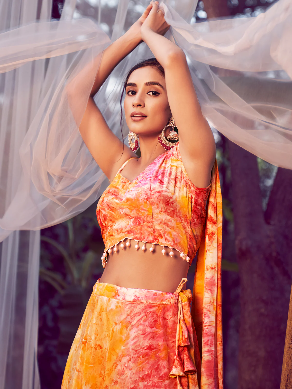 Odette Women Orange Silk Blend Stitched Lehenga Choli - Image 2