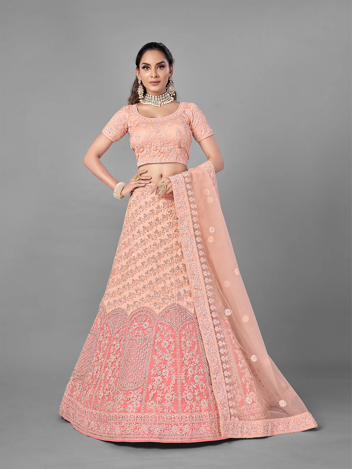 Odette Women Peach Soft Net Semi Stitched Lehenga With Unstitched Blouse - Image 2