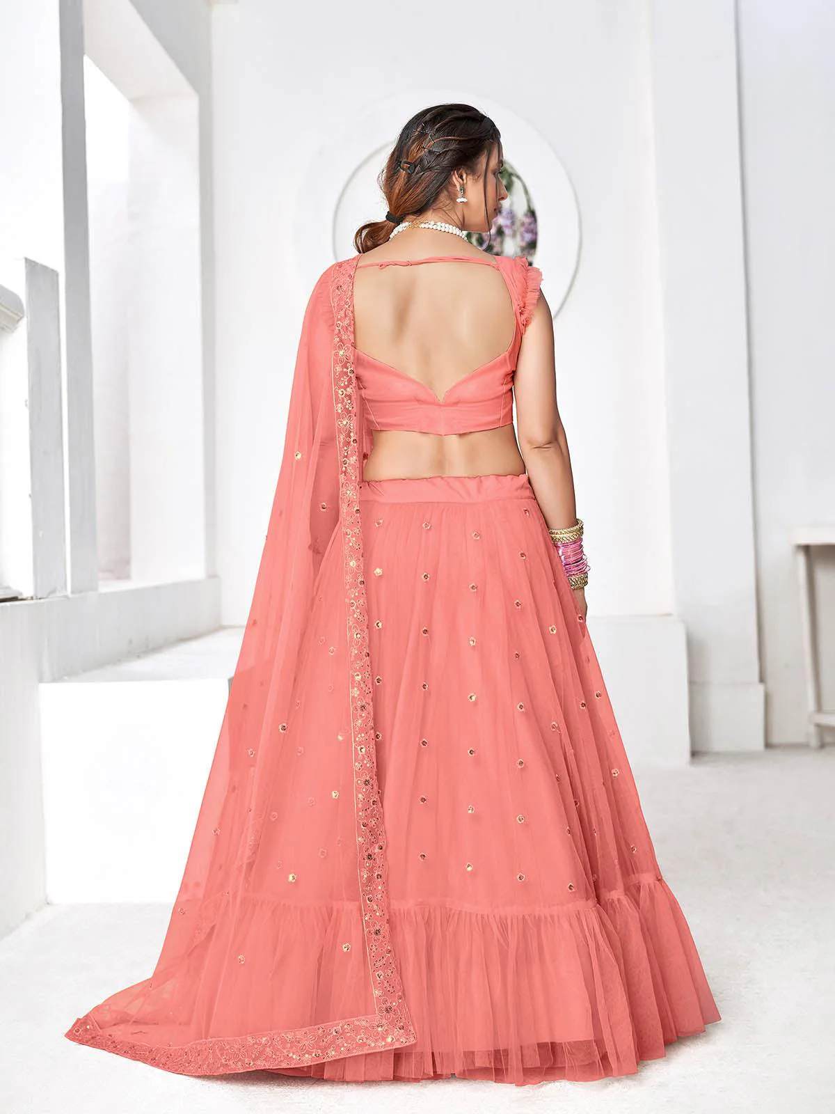 Odette Women Pretty Peach Net Semi Stitched Lehenga With  Unstitched Blouse - Image 4