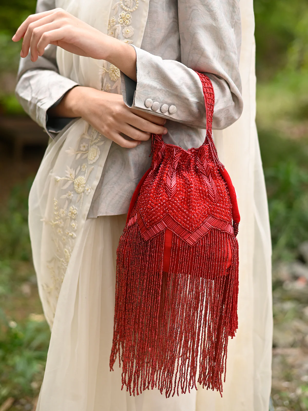 Odette Women Red Beaded Potli Bag With Tassels