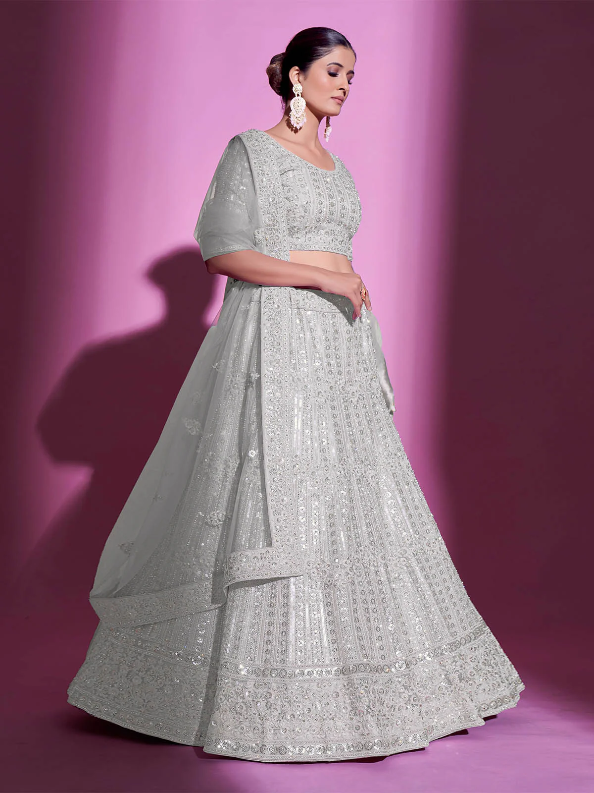 Odette Women White Net Embroidered Semi Stitched Lehenga With Unstitched Blouse - Image 4