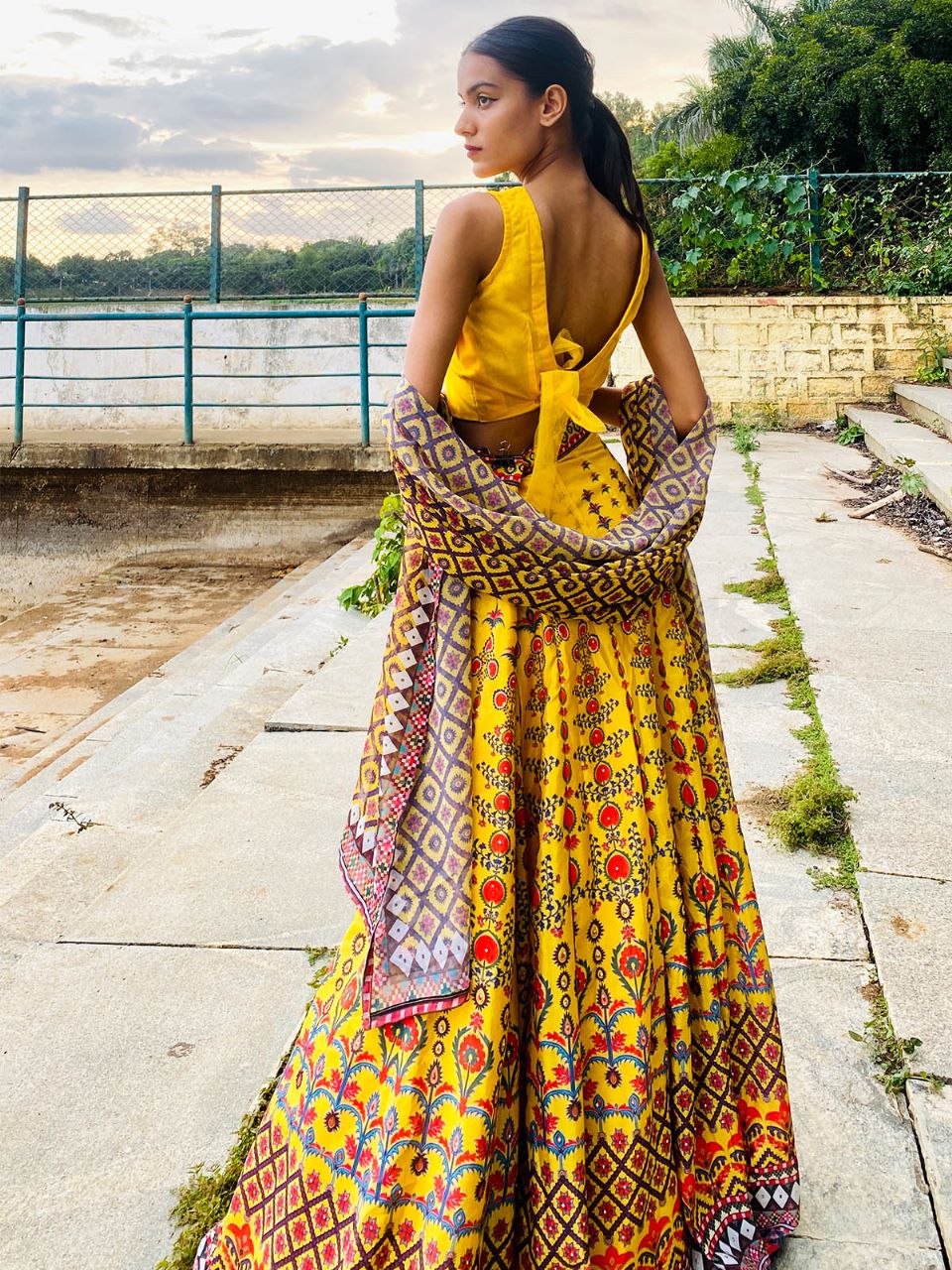 Odette Women Yellow Printed Polyester Stitched Lehenga Choli - Image 3