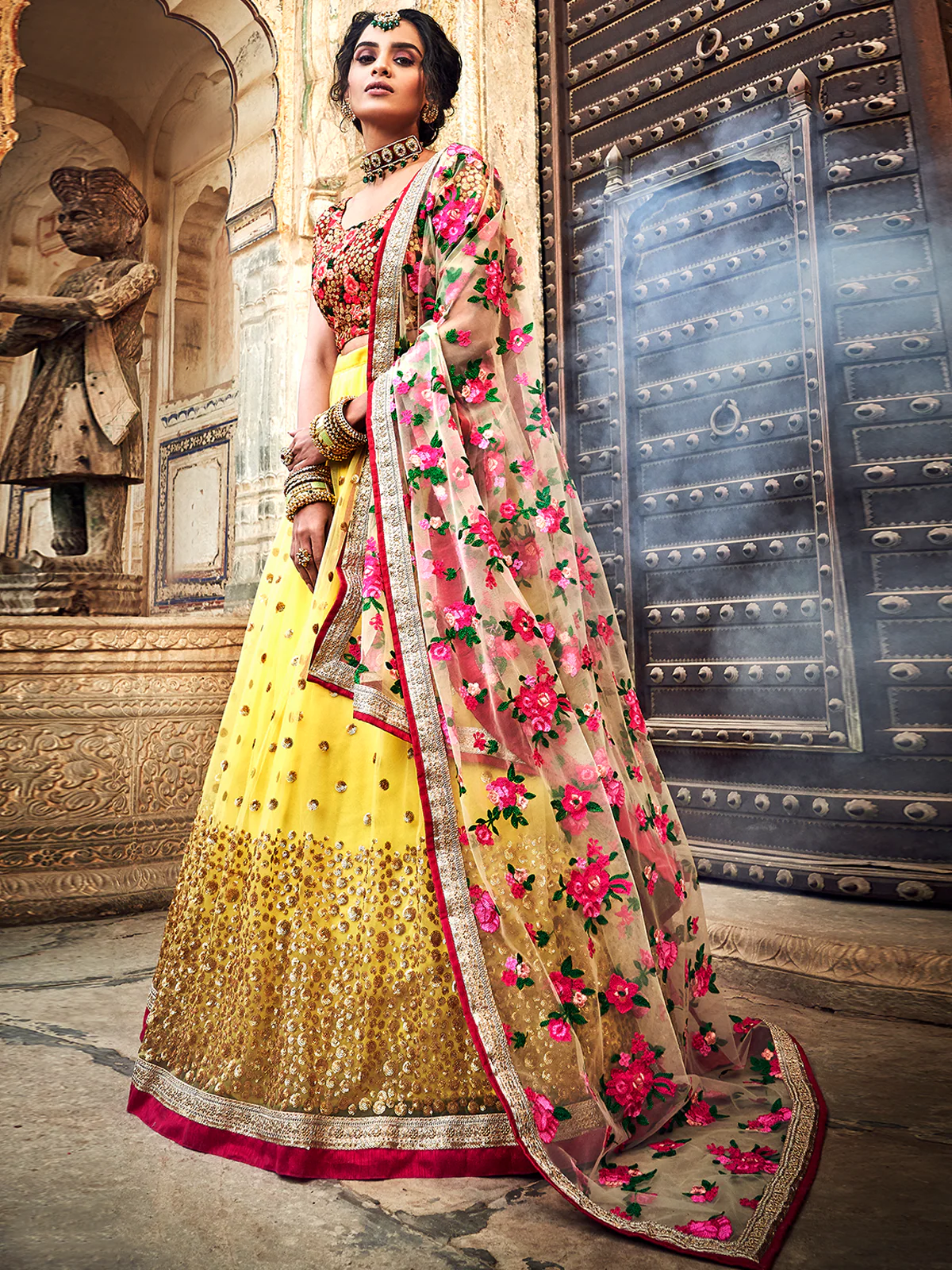 Odette Women Yellow Embroidered Soft Net Semi Stitched Lehenga With Unstitched Blouse - Image 3